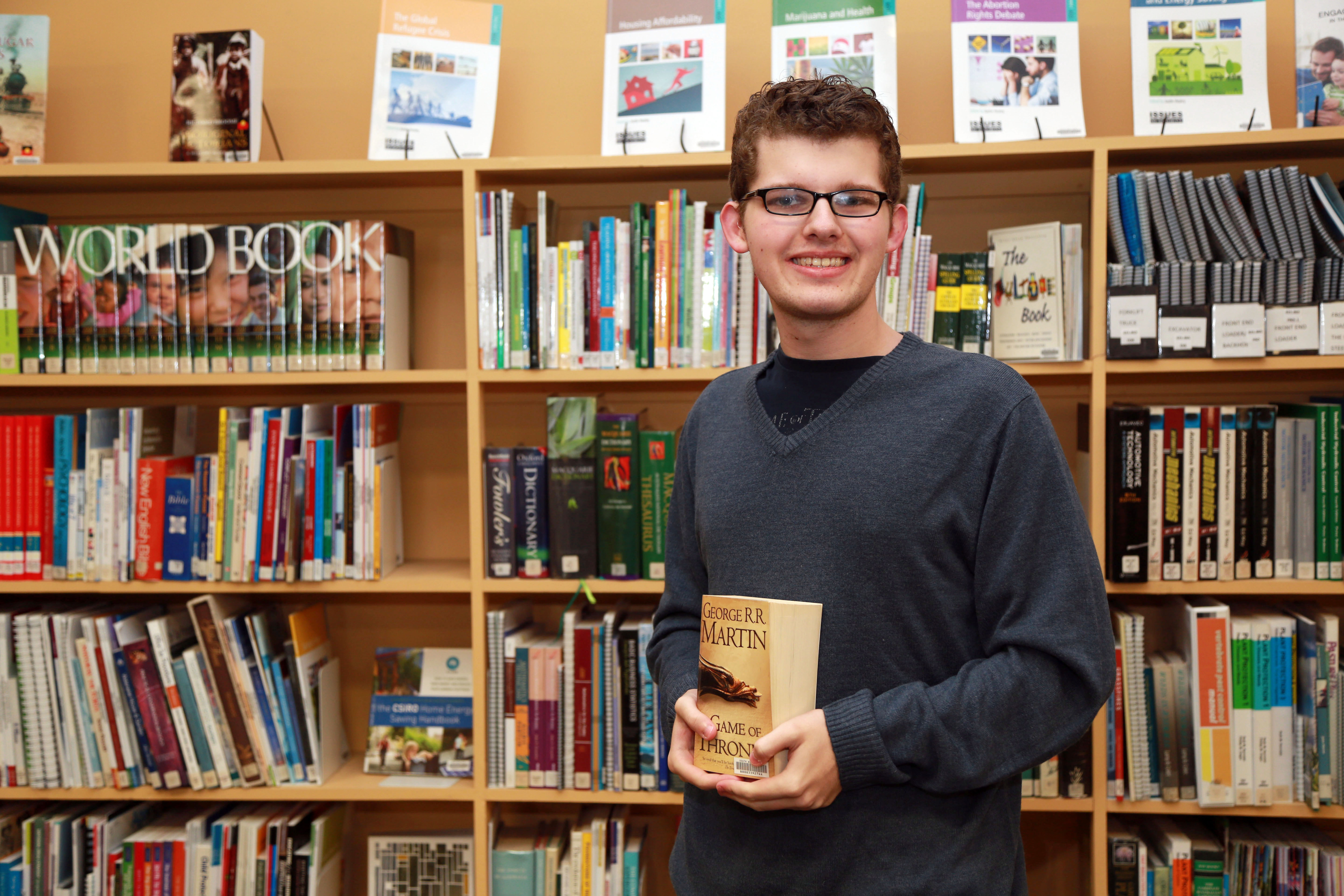 Josh Addinsall in the library